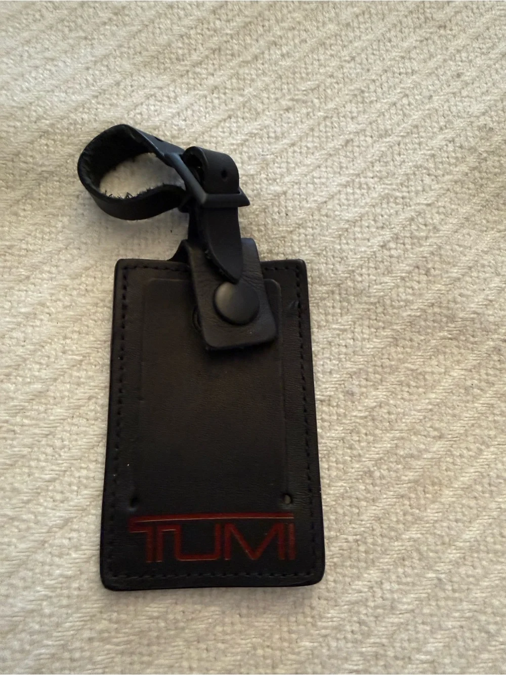 Tumi Black Leather Luggage Tag with Red Logo